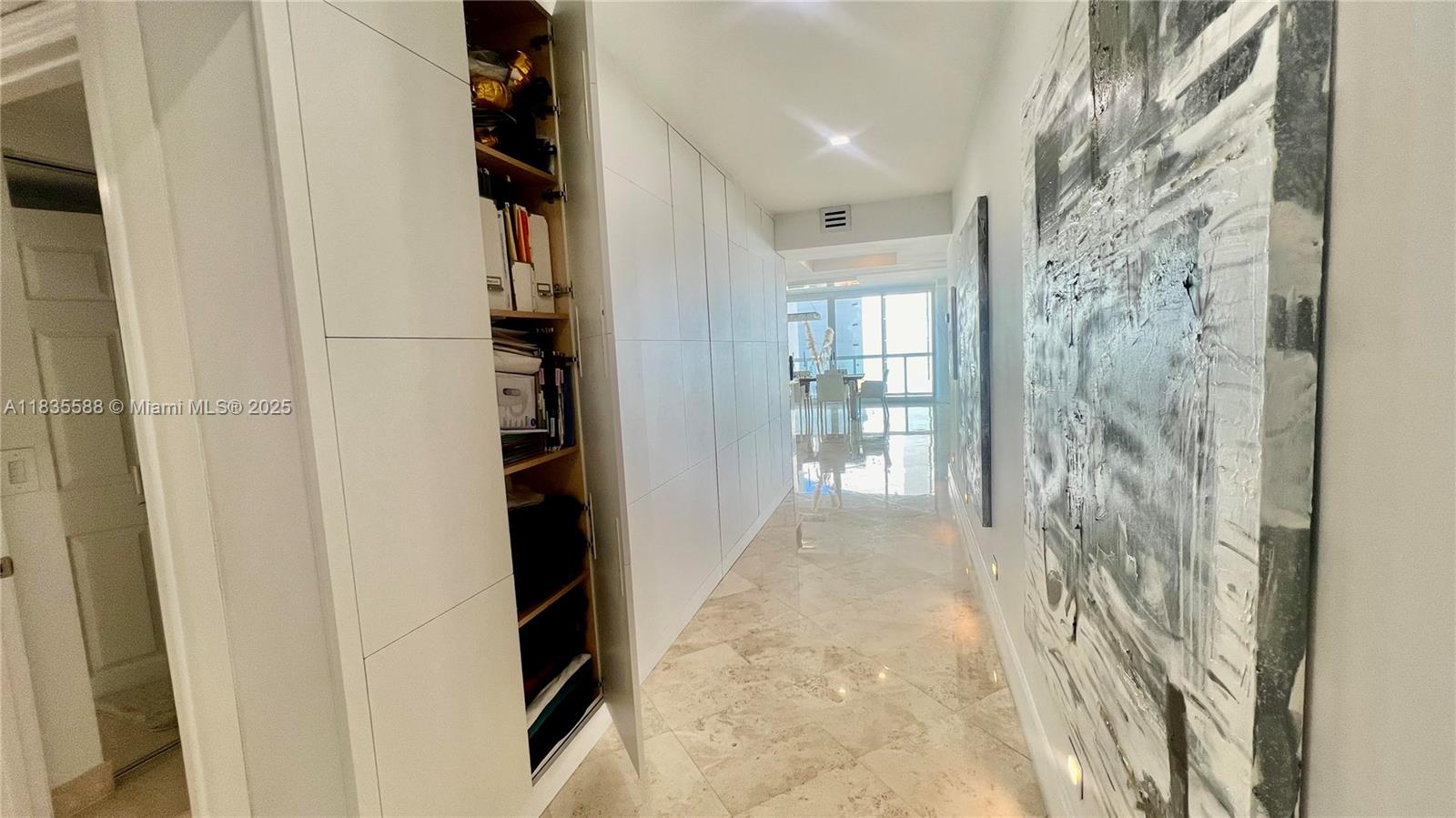Photo of 16400 Collins Ave  #841, Sunny Isles Beach, Florida, 33160 - hallway has hide closets