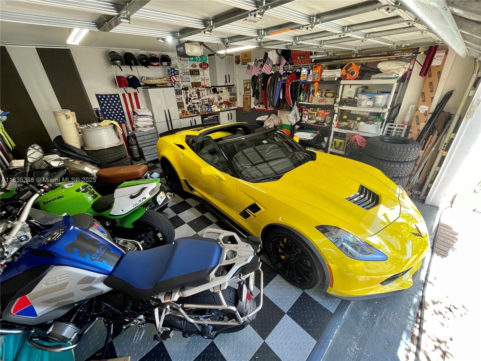 Photo of 1125 Papaya St  (1125), Hollywood, Florida, 33019 - 2 car garage with nice vinyl floors and 220v outlet for electric car charger