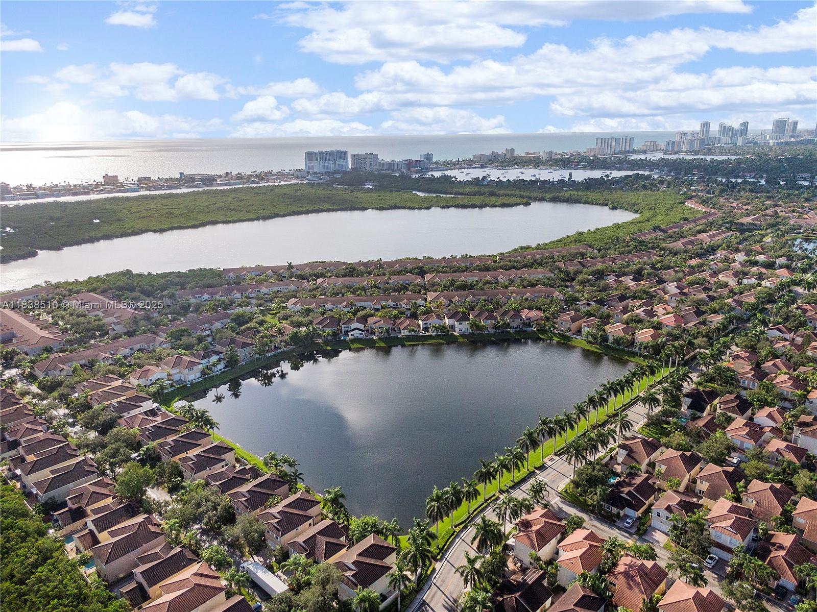 Photo of 1470 Sweetbay Way  (1470), Hollywood, Florida, 33019 - West Lake Village with nature preserve, beach and ocean beyond