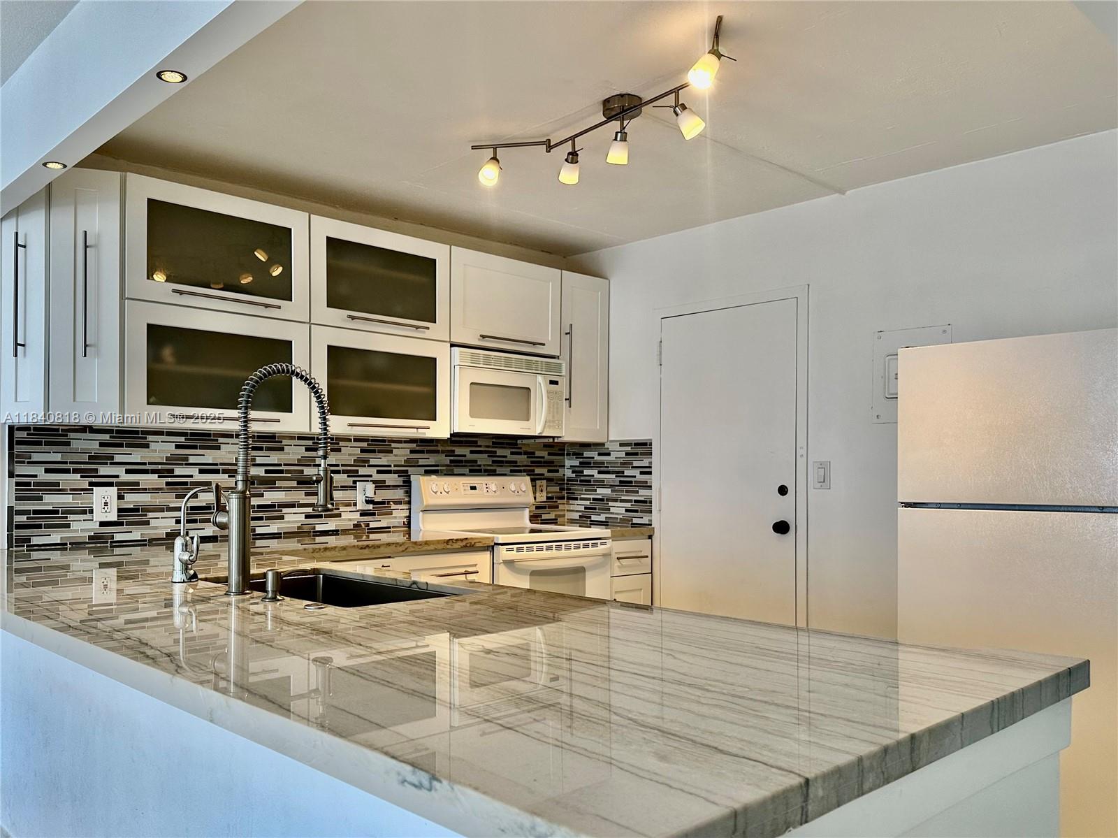 Photo of 427 Golden Isles Dr  #14F, Hallandale Beach, Florida, 33009 - 