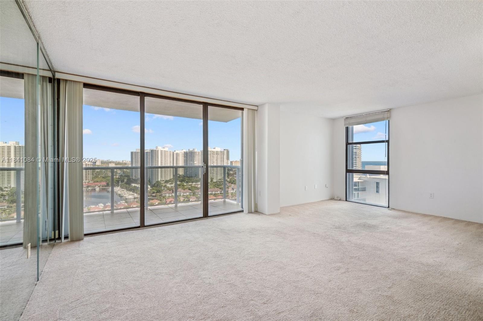 Photo of 3675 Country Club Dr #2502, Aventura, Florida, 33180 - Living Room & Open Den Area