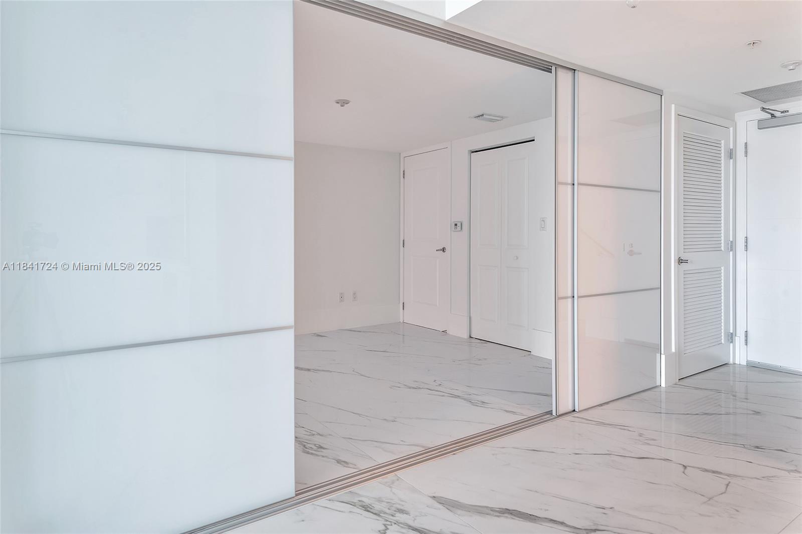 Photo of 400 Sunny Isles Blvd  #917, Sunny Isles Beach, Florida, 33160 - Hallway and bedroom 3