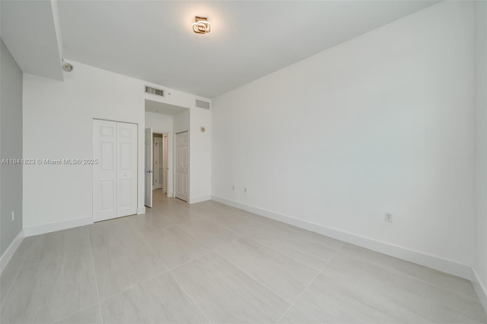 Photo of 140 Dixie Hwy  #1007, Hollywood, Florida, 33020 - 2nd bedroom with custom. walk in closet and 2nd closet