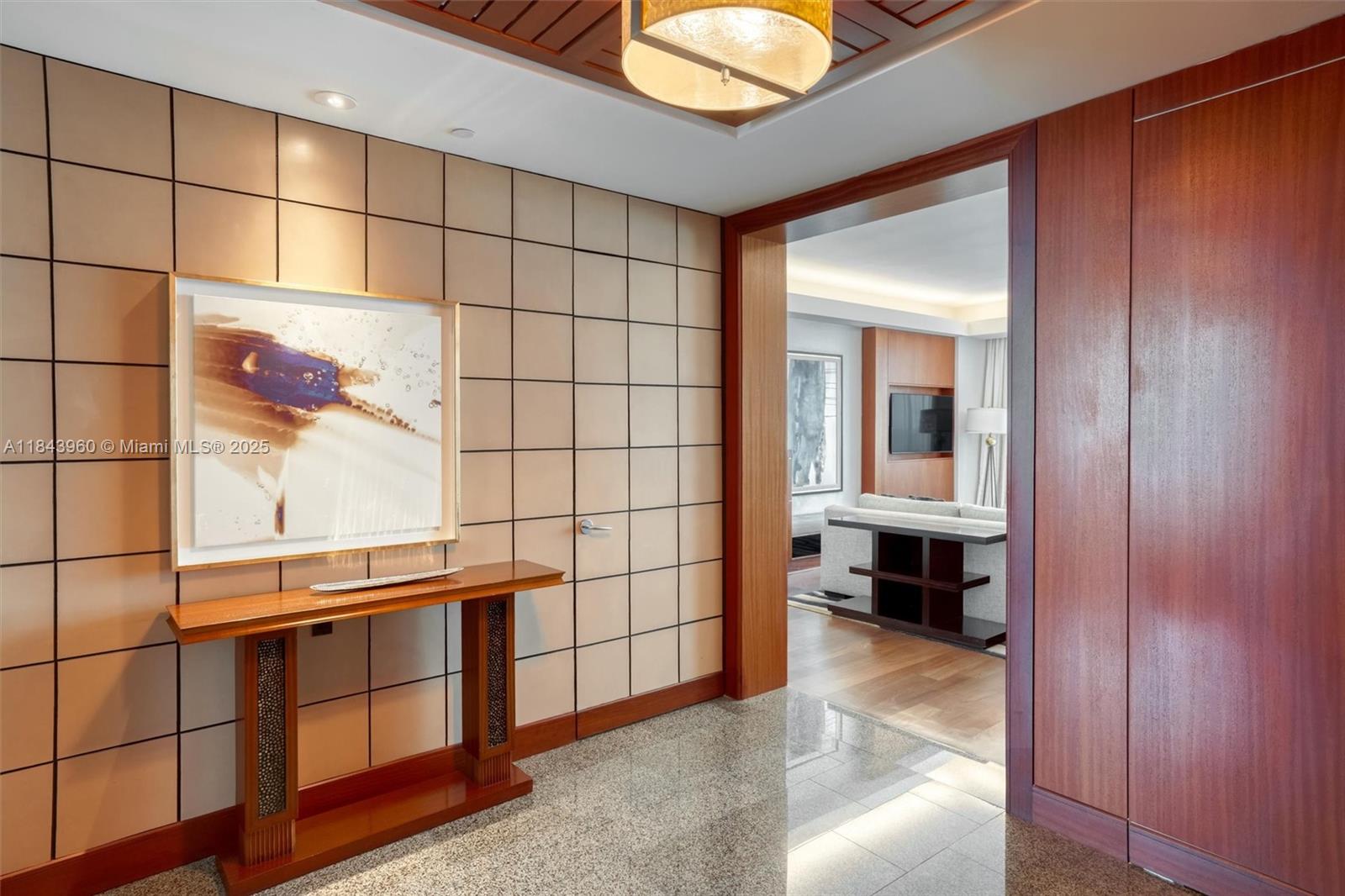 Photo of 10295 Collins Ave #1014 (10295), Bal Harbour, Florida, 33154 - Foyer entrance with living to the right.