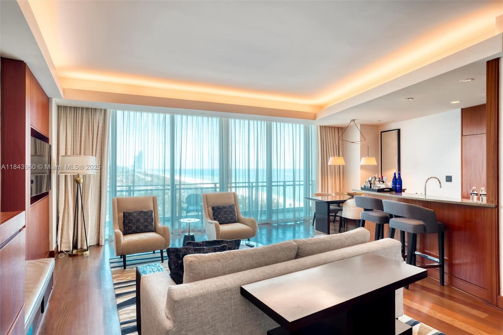 Photo of 10295 Collins Ave #1014 (10295), Bal Harbour, Florida, 33154 - Sofa bed in living room area.