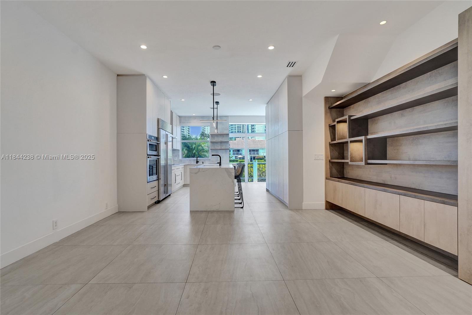 Photo of 3757 208th Ter  (3757), Aventura, Florida, 33180 - Den and kitchen.