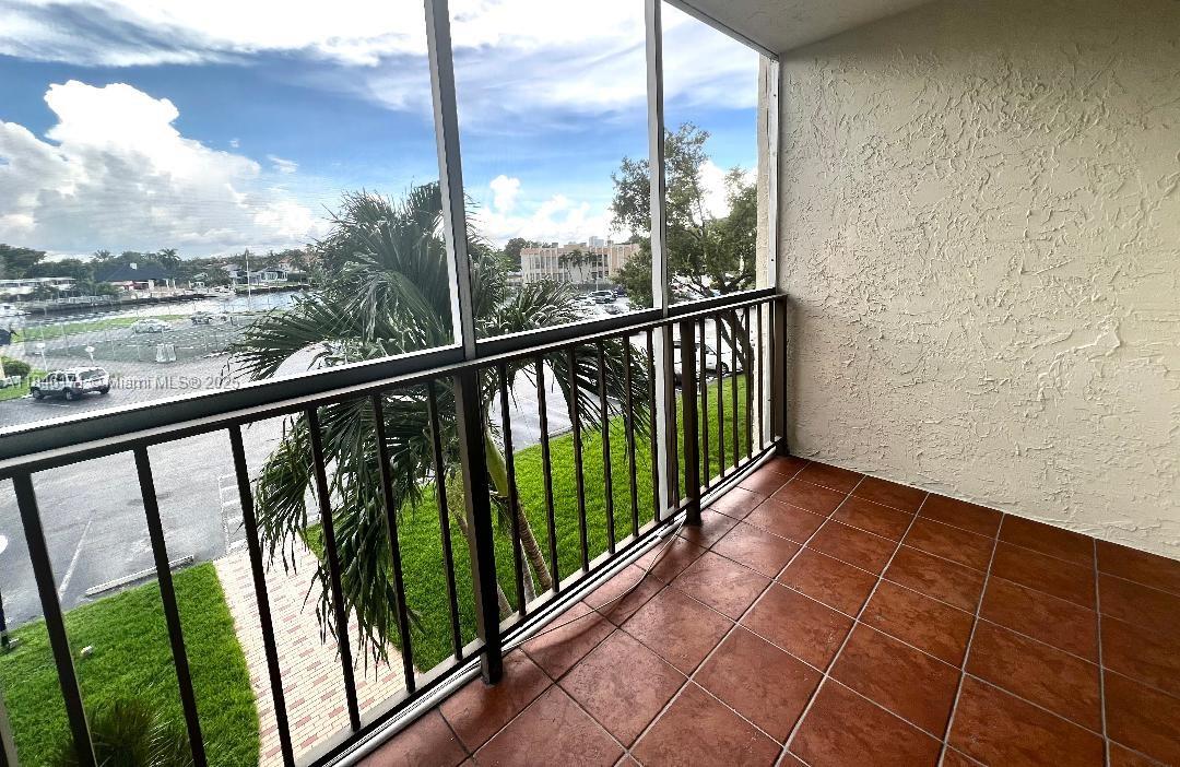Photo of 701 Three Islands Blvd  #315, Hallandale Beach, Florida, 33009 - Large Screened Balcony/w Water View
