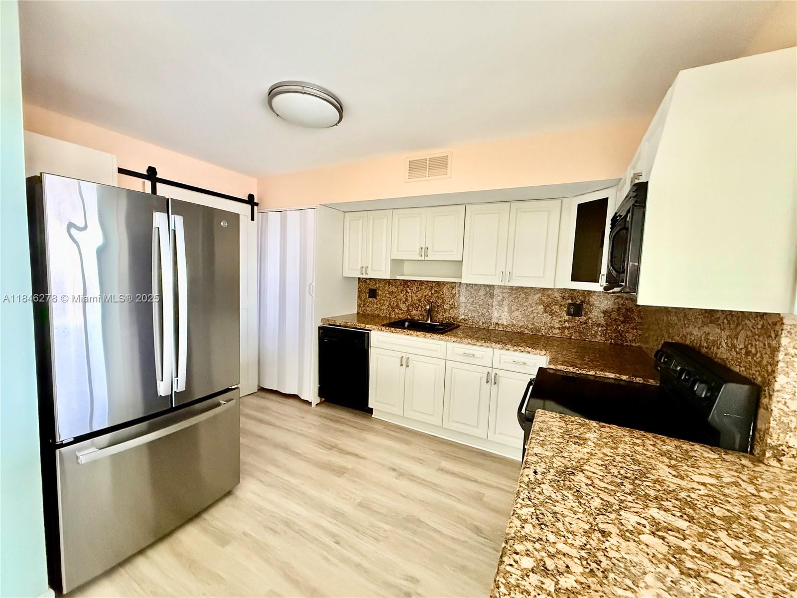 Photo of 1600 Ocean Dr  #7B, Hollywood, Florida, 33019 - Updated kitchen with new SS refrigerator
