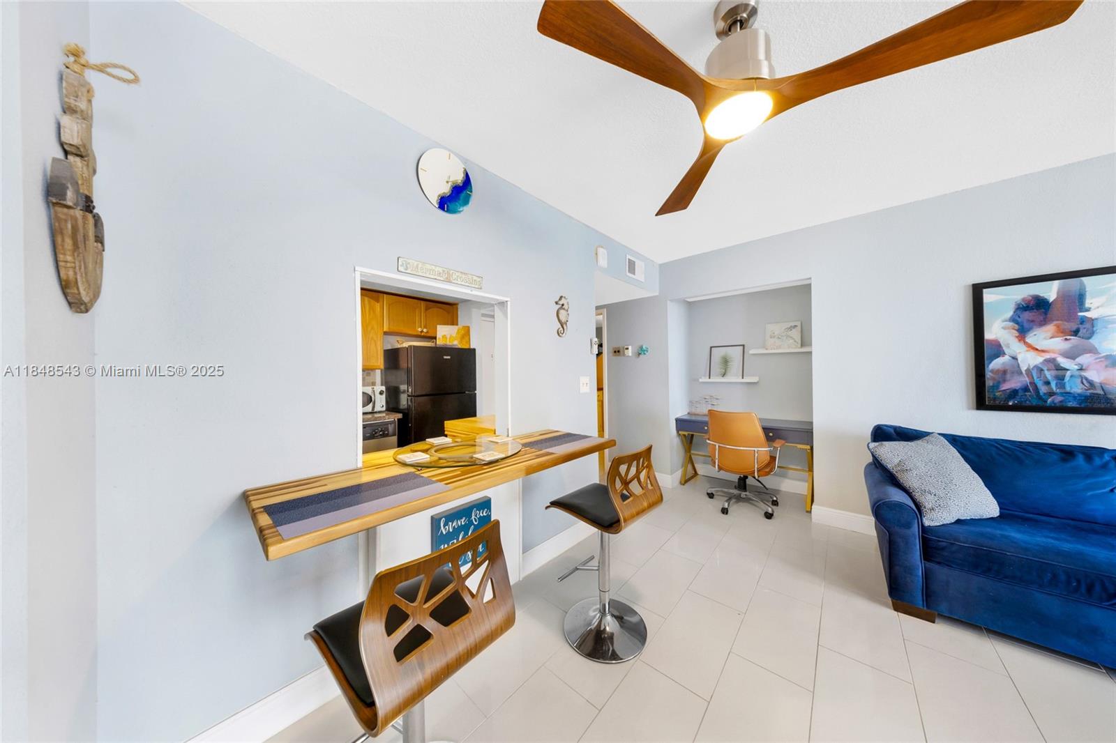 Photo of 3180 Ocean Dr  #607, Hallandale Beach, Florida, 33009 - Living room office nook and eat in counter