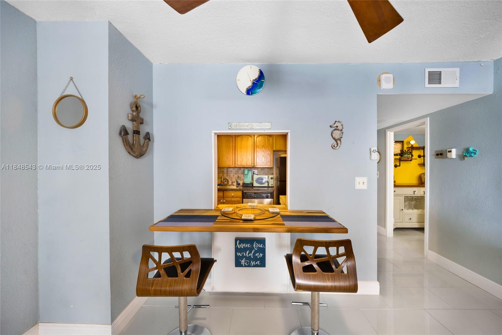 Photo of 3180 Ocean Dr  #607, Hallandale Beach, Florida, 33009 - Eat in counter and kitchen background