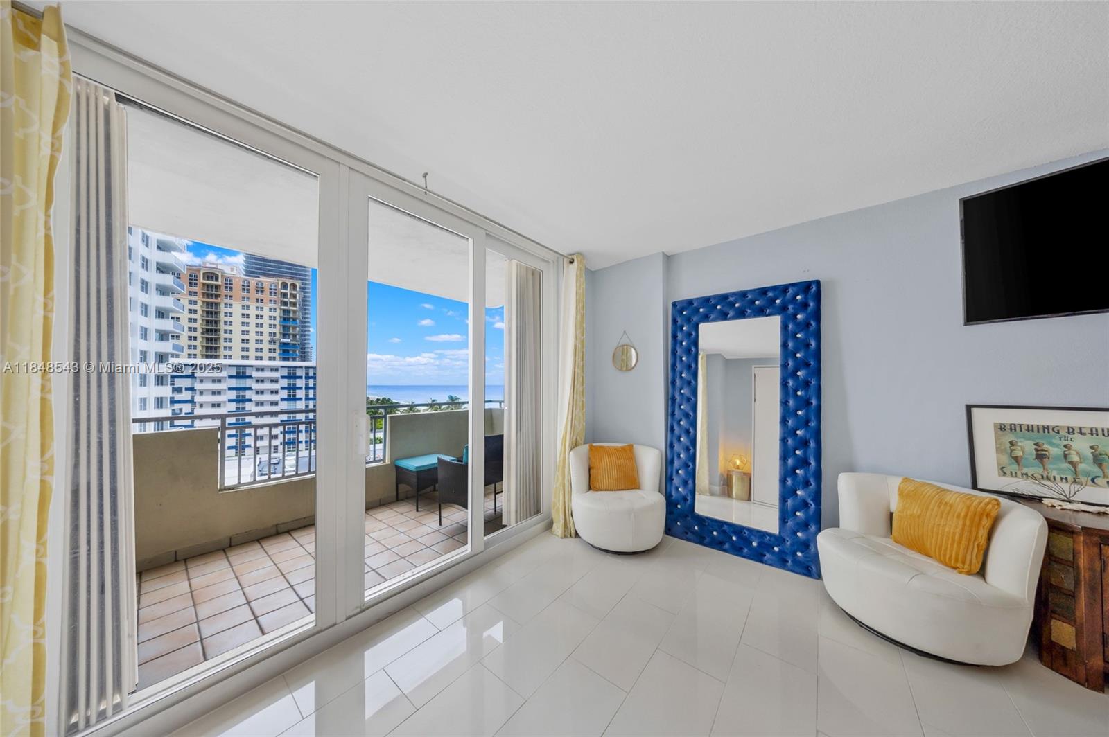 Photo of 3180 Ocean Dr  #607, Hallandale Beach, Florida, 33009 - Living room to beach water view