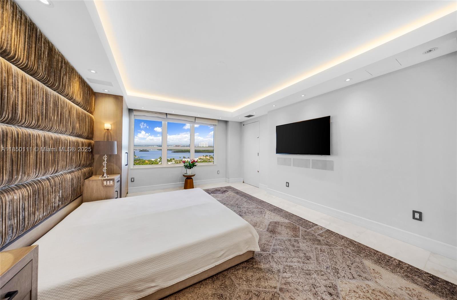 Photo of 9801 Collins Ave  #PH11 Great Renovation, Bal Harbour, Florida, 33154 - Large master bedroom looking at the sunsets Intercostal and city views
