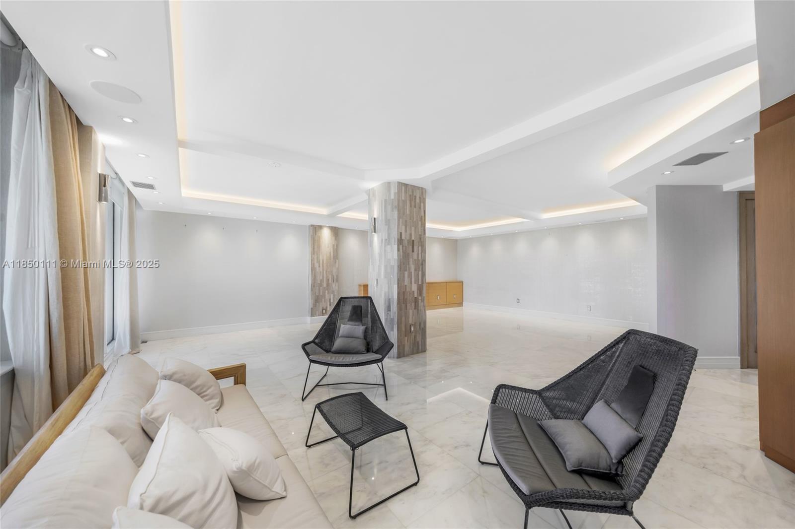 Photo of 9801 Collins Ave  #PH11 Great Renovation, Bal Harbour, Florida, 33154 - These are the patio furniture in the dining area because the new glass balcony is in the process of ending.