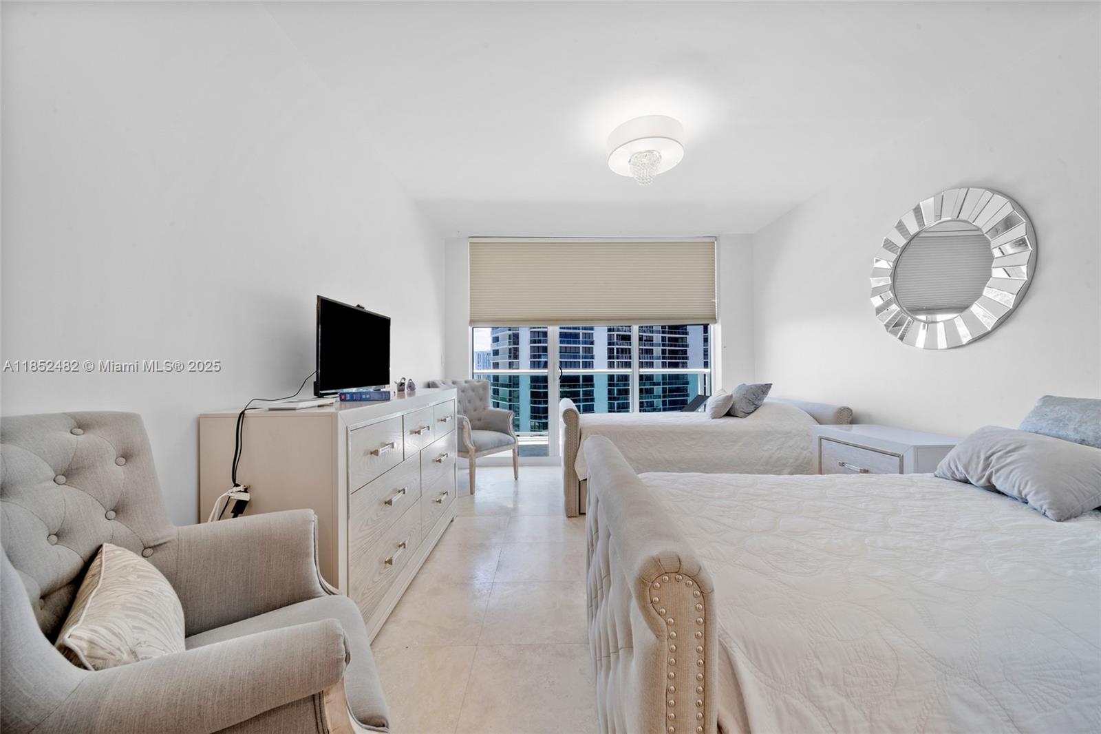 Photo of 20201 Country Club Dr  #1404, Aventura, Florida, 33180 - 2 twin beds with an extra roller bed under