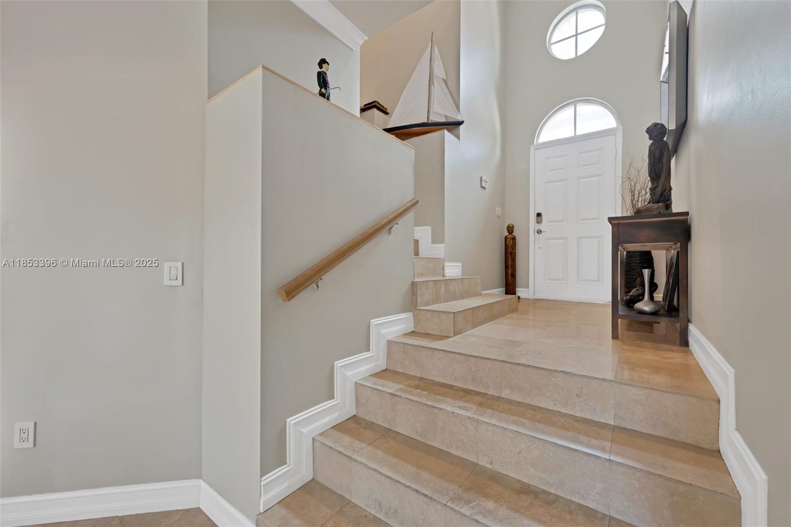 Photo of 18345 30th Pl  (18345), Aventura, Florida, 33160 - to walk into the dining/living room area from front door