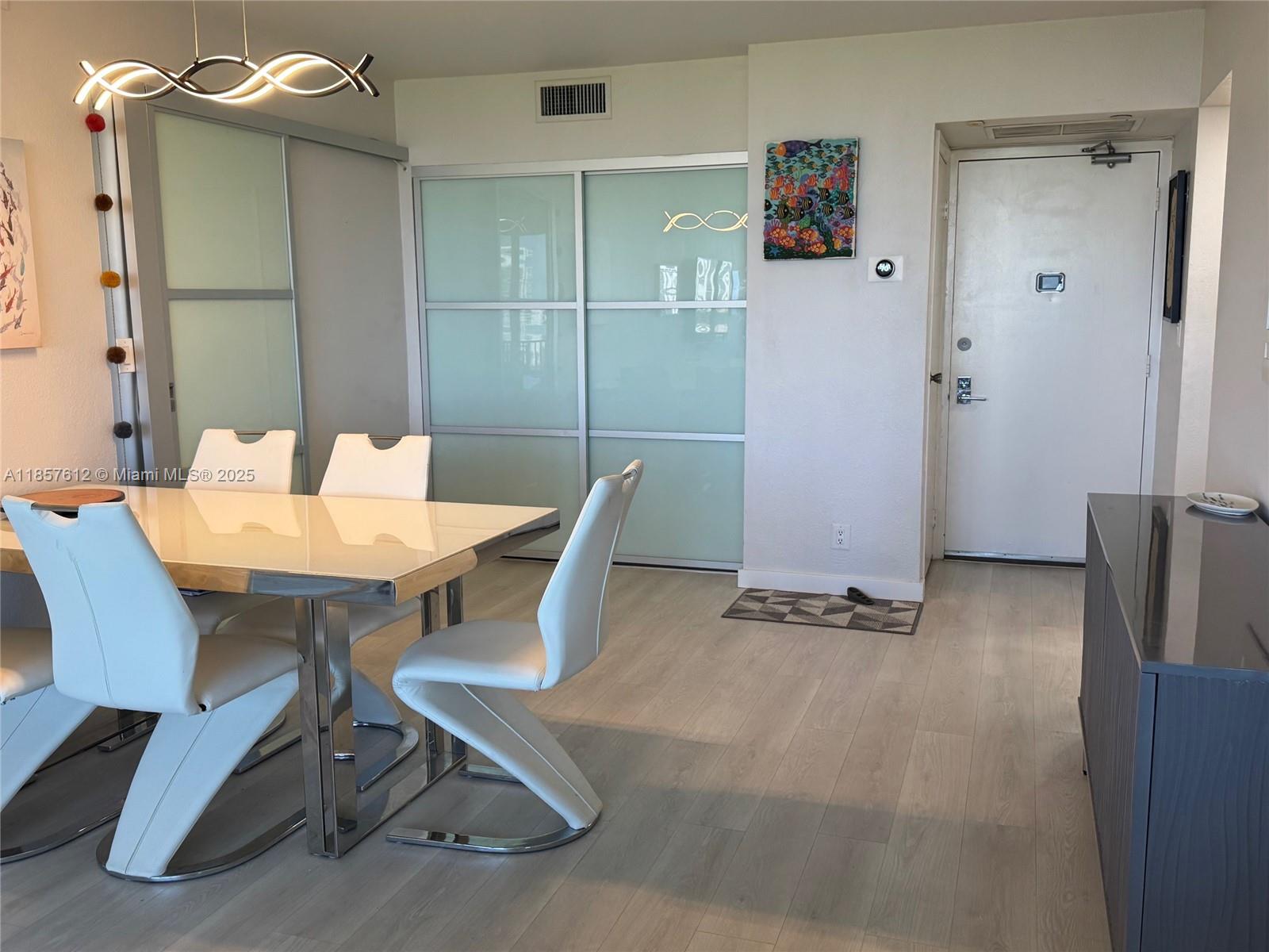 Photo of 20335 Country Club Dr  #1808, Aventura, Florida, 33180 - Entry door with dining area