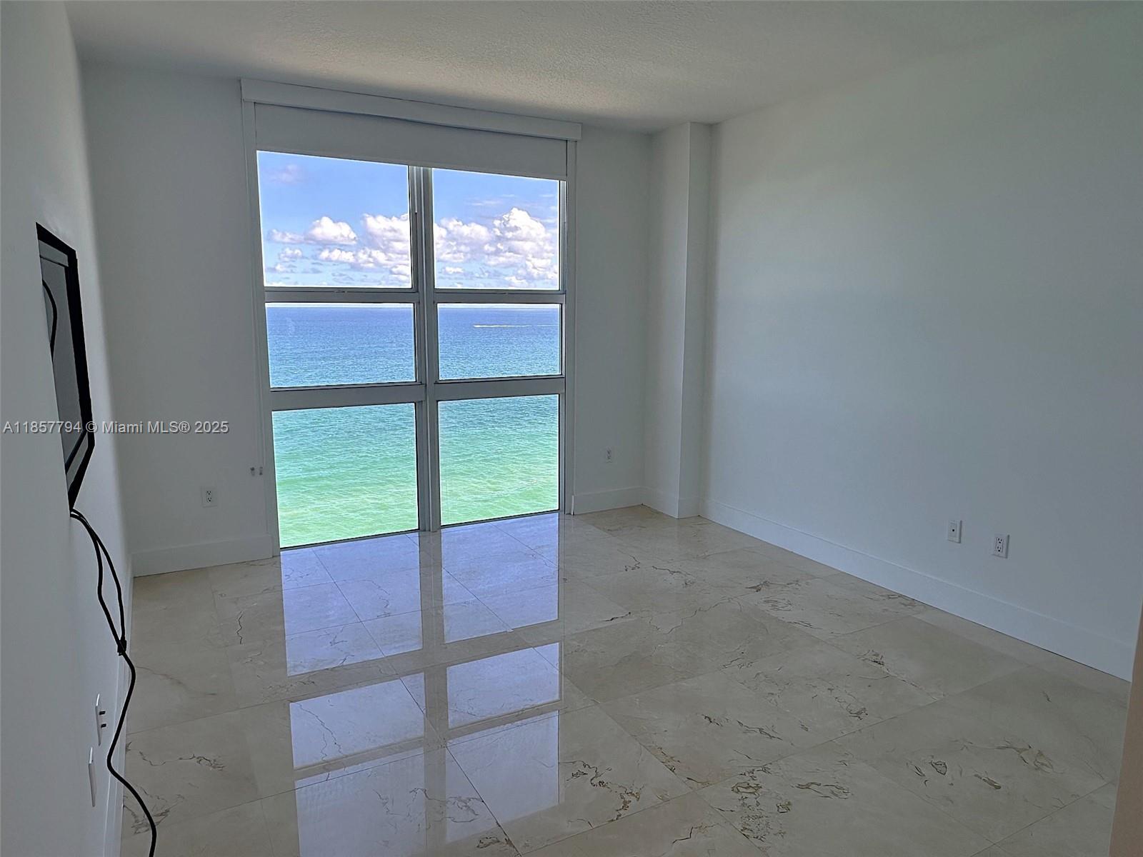 Photo of 2080 Ocean Dr #MPH12, Hallandale Beach, Florida, 33009 - Floor to Ceiling window in Primary