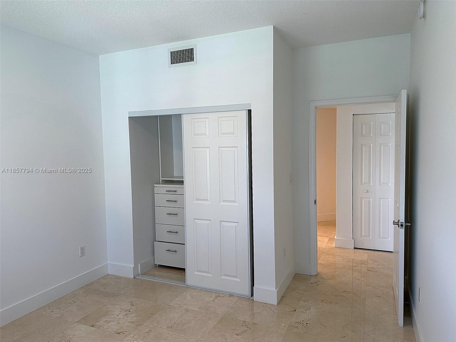Photo of 2080 Ocean Dr #MPH12, Hallandale Beach, Florida, 33009 - Bedroom 2 entrance and custom closet