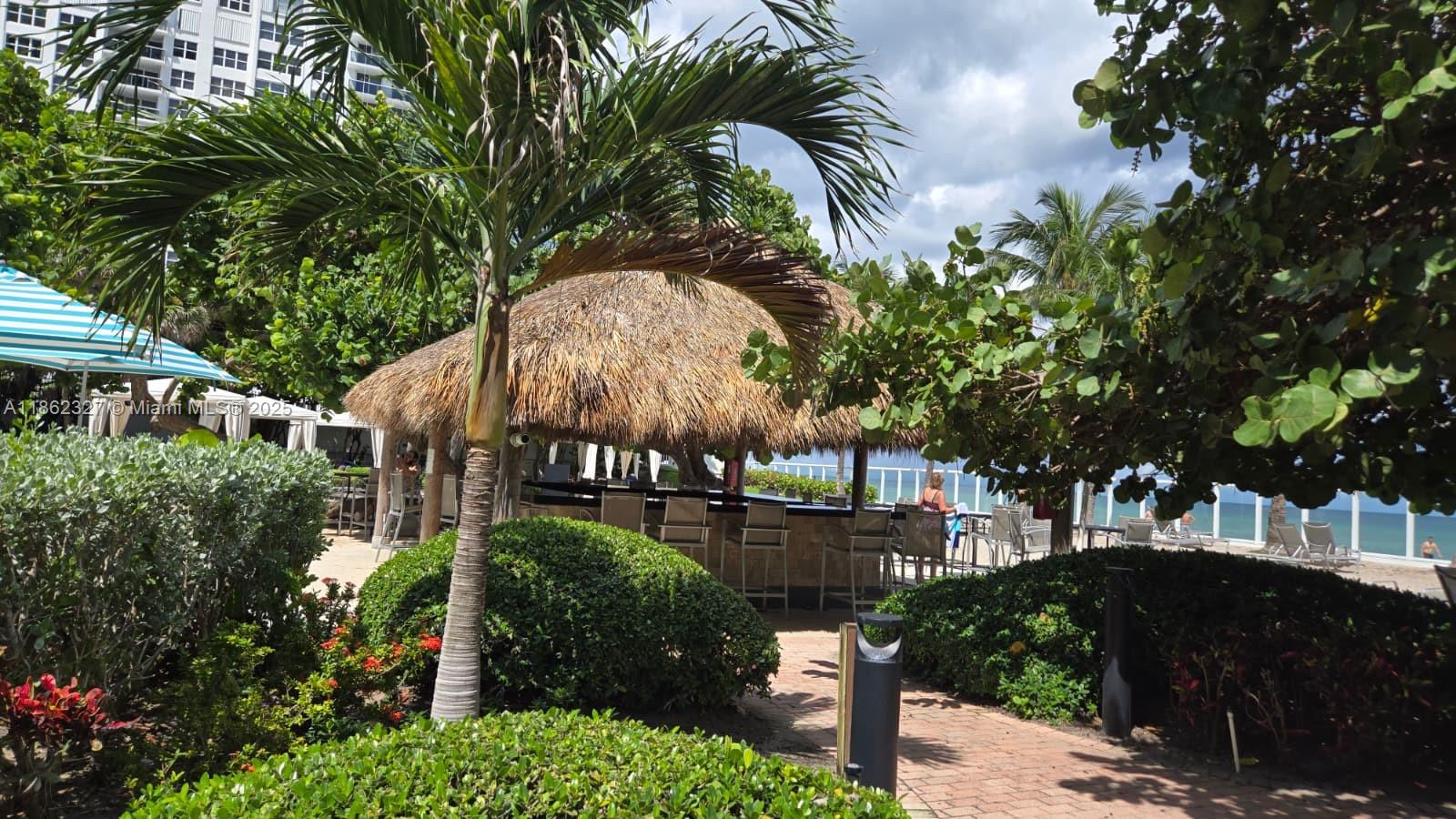 Photo of 3000 Ocean Dr  #108, Hollywood, Florida, 33019 - Building S 3001 - Tiki Bar area