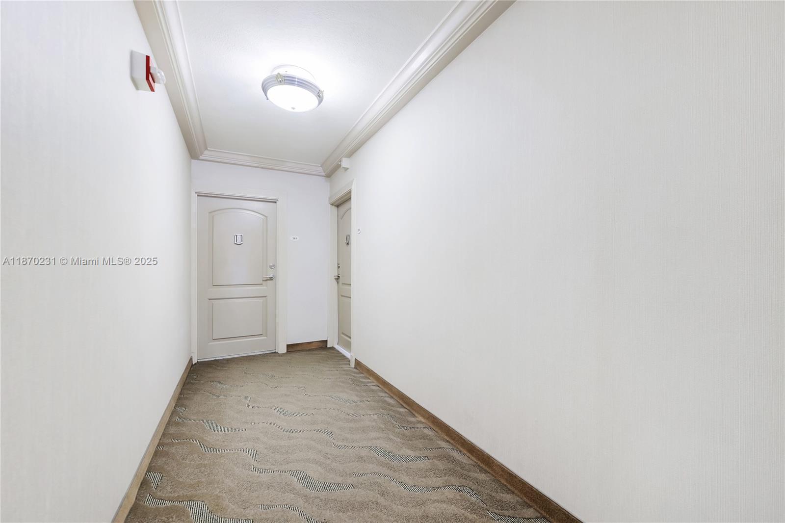 Photo of 3675 Country Club Dr  #204, Aventura, Florida, 33180 - Hallway to unit