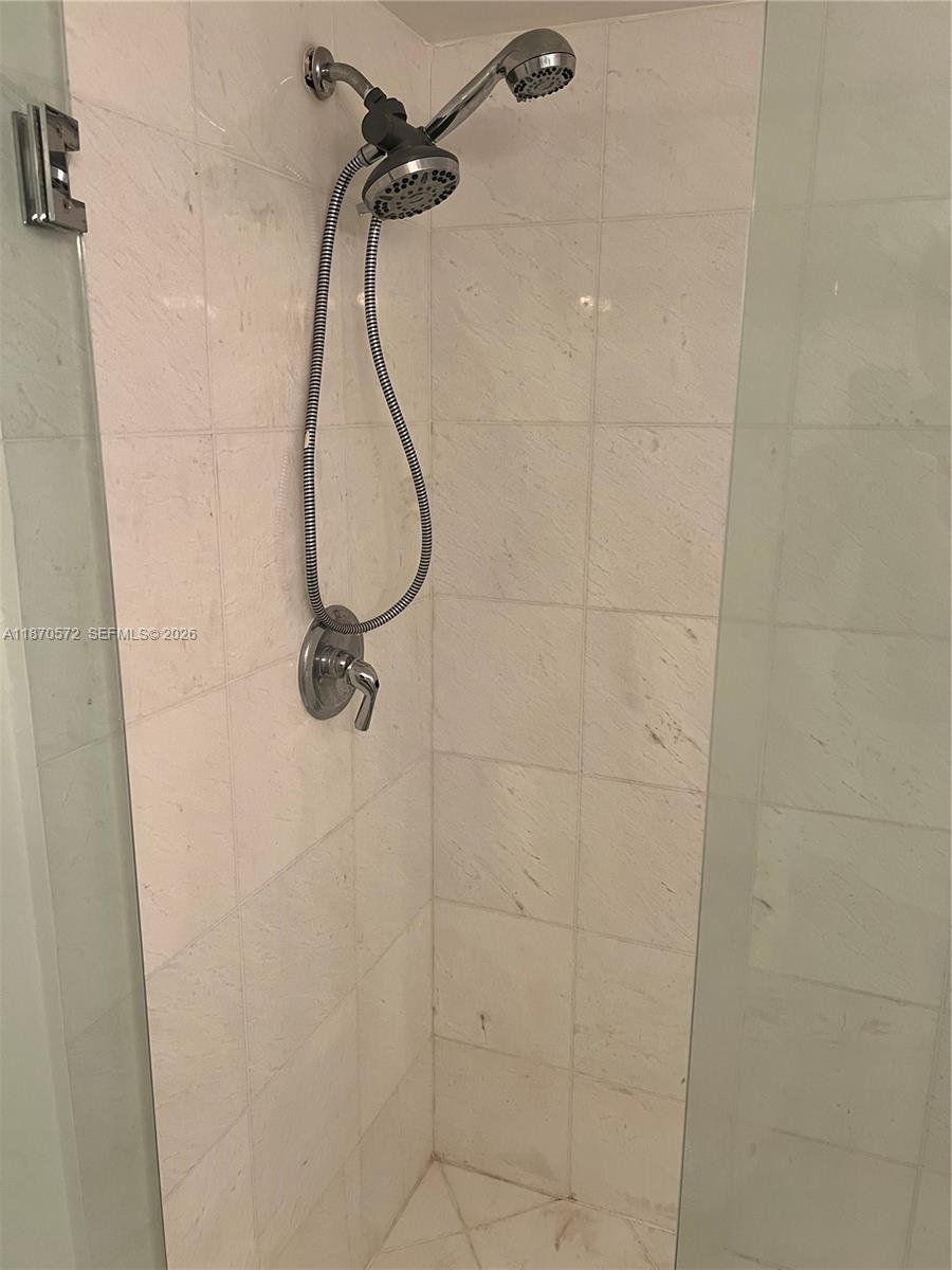 Photo of 19101 36th Ct  #1411, Aventura, Florida, 33180 - marble shower 2nd bathroom seem less glass
