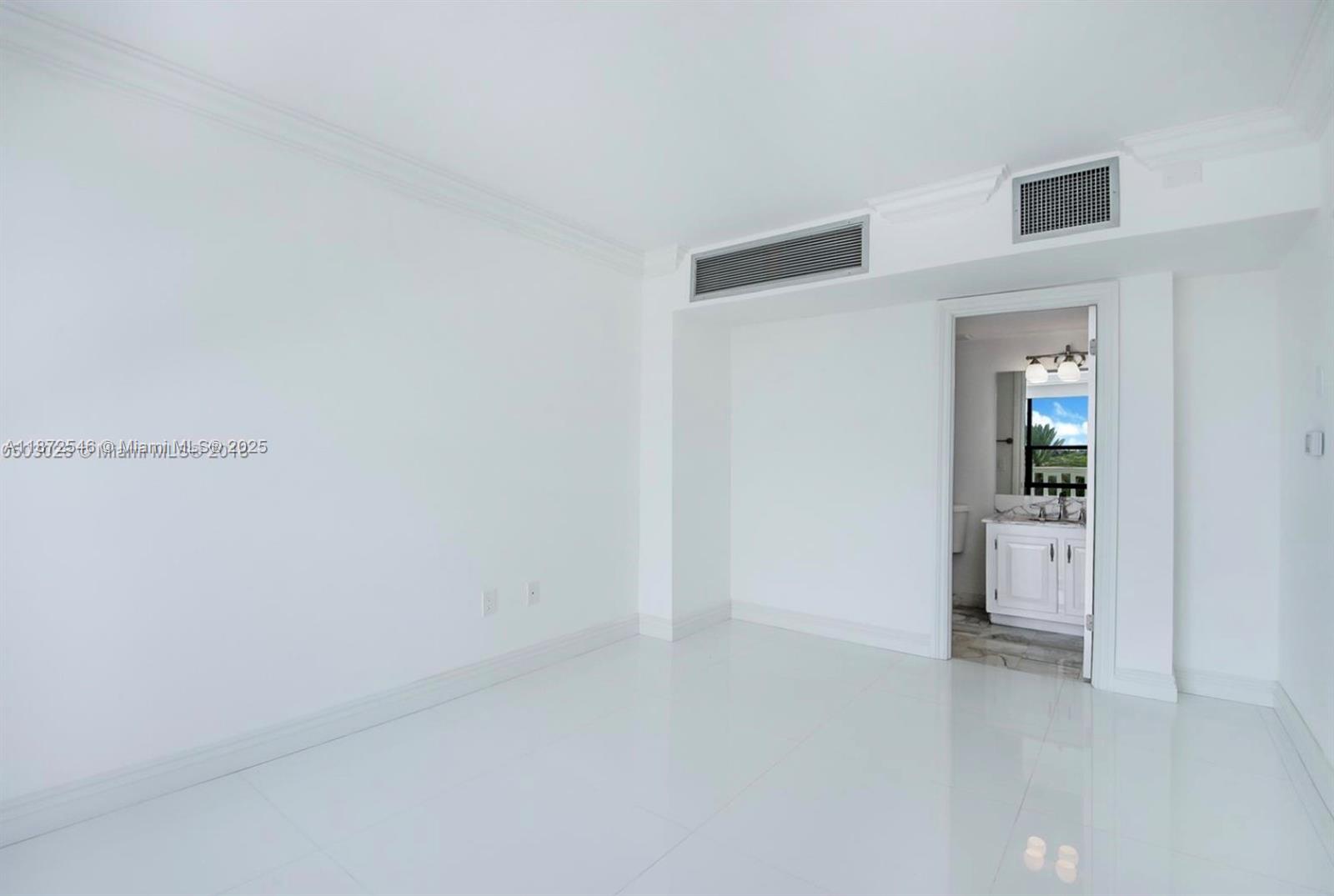 Photo of 9801 Collins Ave  #5Q, Bal Harbour, Florida, 33154 - 2nd bedroom in- suite with large balcony doors