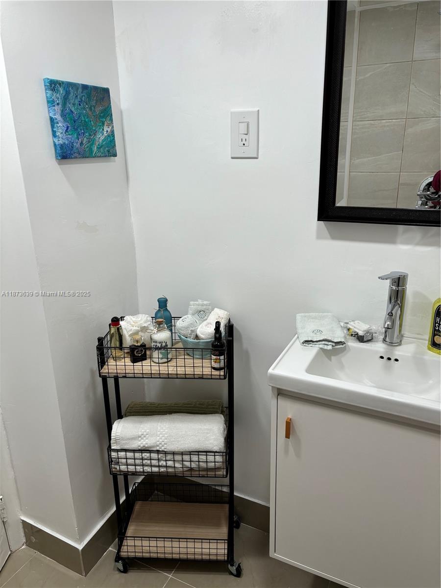 Photo of 3475 Country Club Dr  #116, Aventura, Florida, 33180 - BATHROOM AT THE 1ST FLOOR