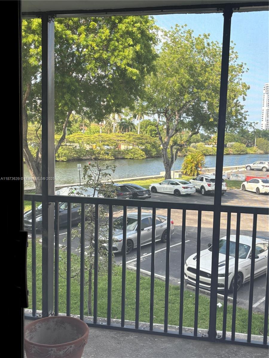 Photo of 3475 Country Club Dr  #116, Aventura, Florida, 33180 - BALCONY AT THE 2ND FLOOR.MASTER BEDROOM WITH PRIVATE BALCONY