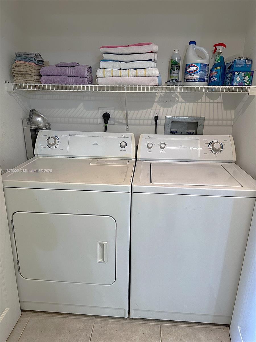 Photo of 2080 OCEAN DRIVE  #1010, Hallandale Beach, Florida, 33009 - Laundry closet with full size washer $ dryer