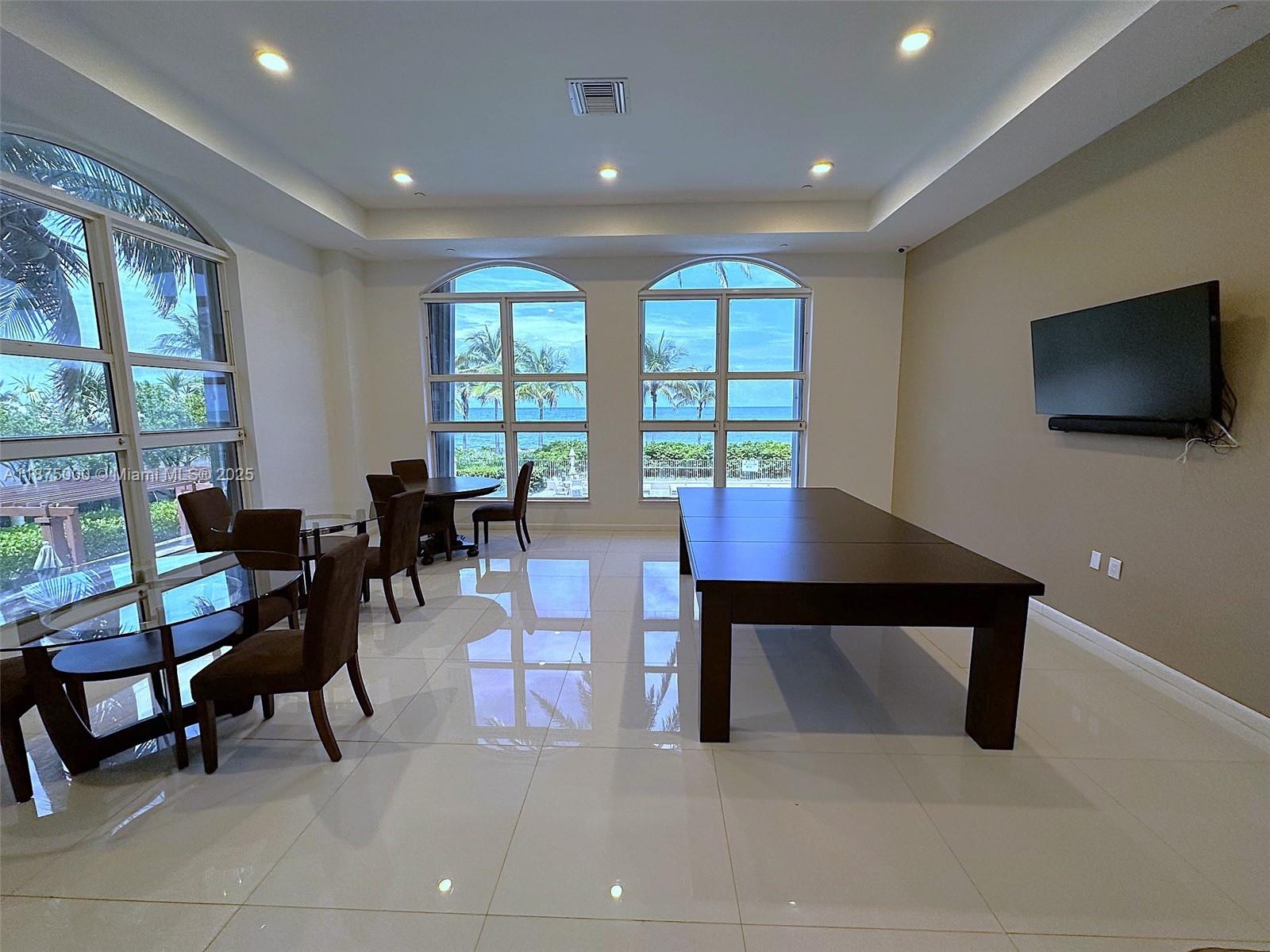 Photo of 2080 OCEAN DRIVE  #1010, Hallandale Beach, Florida, 33009 - Clubhouse, with kitchen, dining tables and pool table