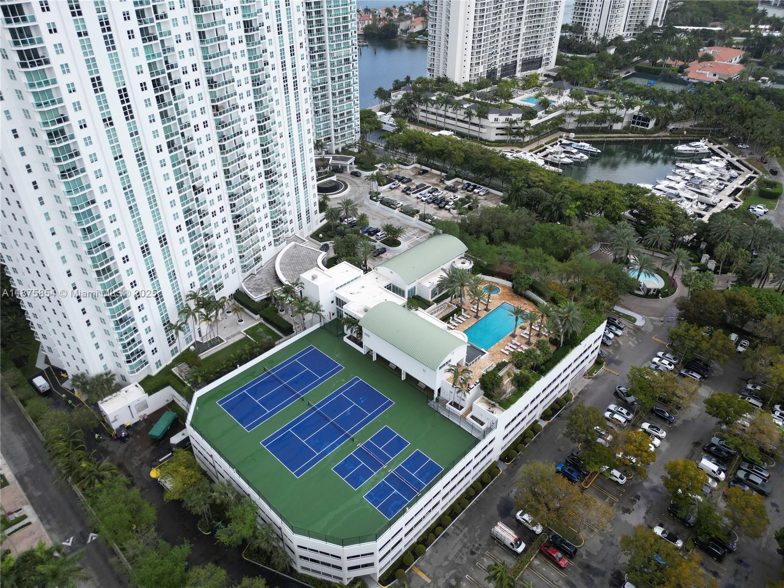 Photo of 3301 183rd St #PH9, Aventura, Florida, 33160 - Tennis, pickleball, Lifestyle pool, Spa & Gym area.Photos may be digitally staged or AI-edited for visualization purposes.