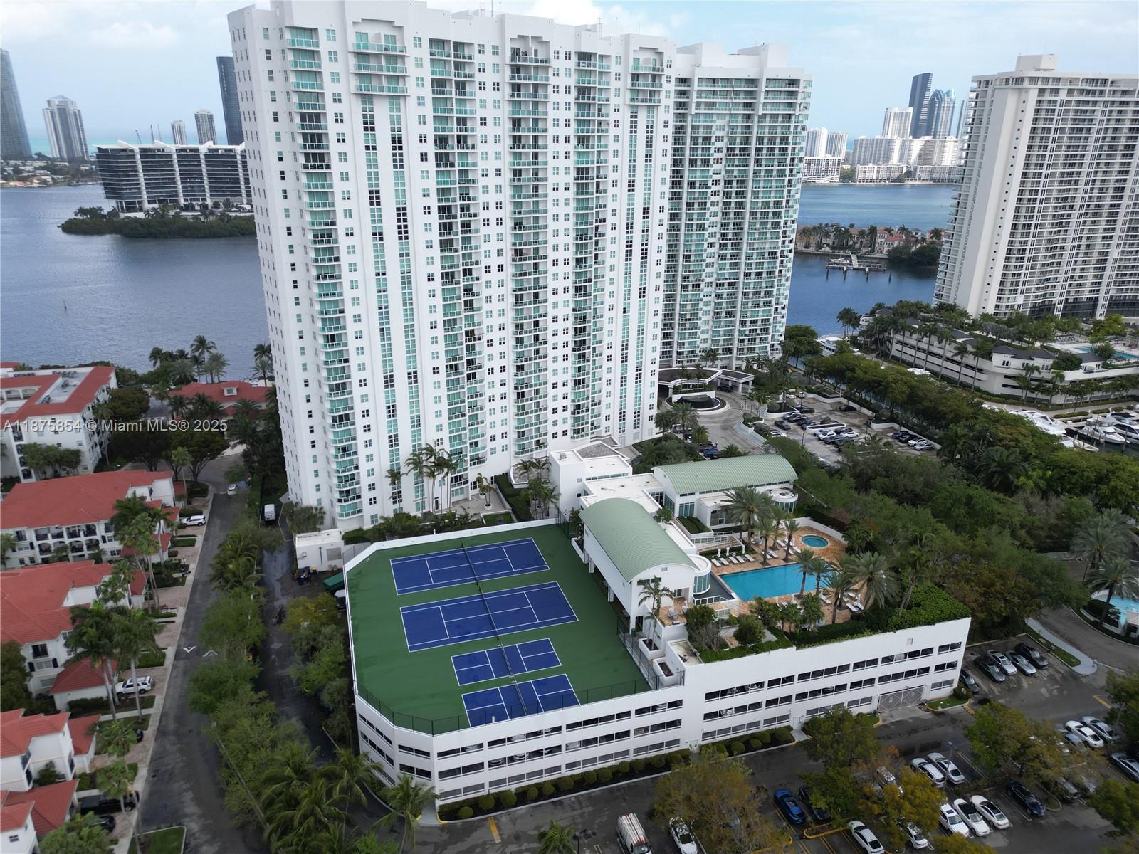 Photo of 3301 183rd St #PH9, Aventura, Florida, 33160 - Tennis, pickleball, Lifestyle pool, Spa & Gym area.Photos may be digitally staged or AI-edited for visualization purposes.