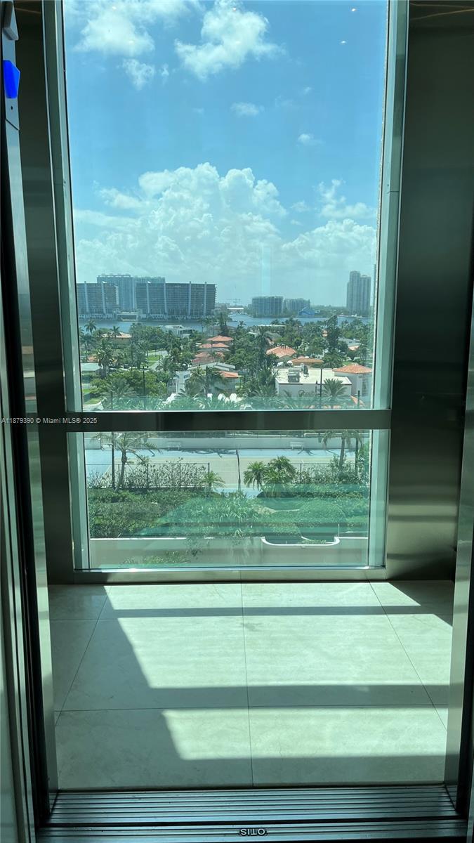 Photo of 18671 Collins Ave  #804, Sunny Isles Beach, Florida, 33160 - elevator with a view!