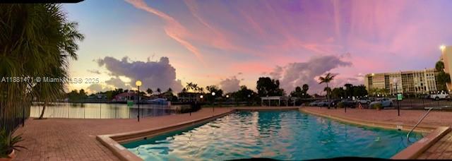 Photo of 601 Three Islands Blvd  #510, Hallandale Beach, Florida, 33009 - community pool sunset
