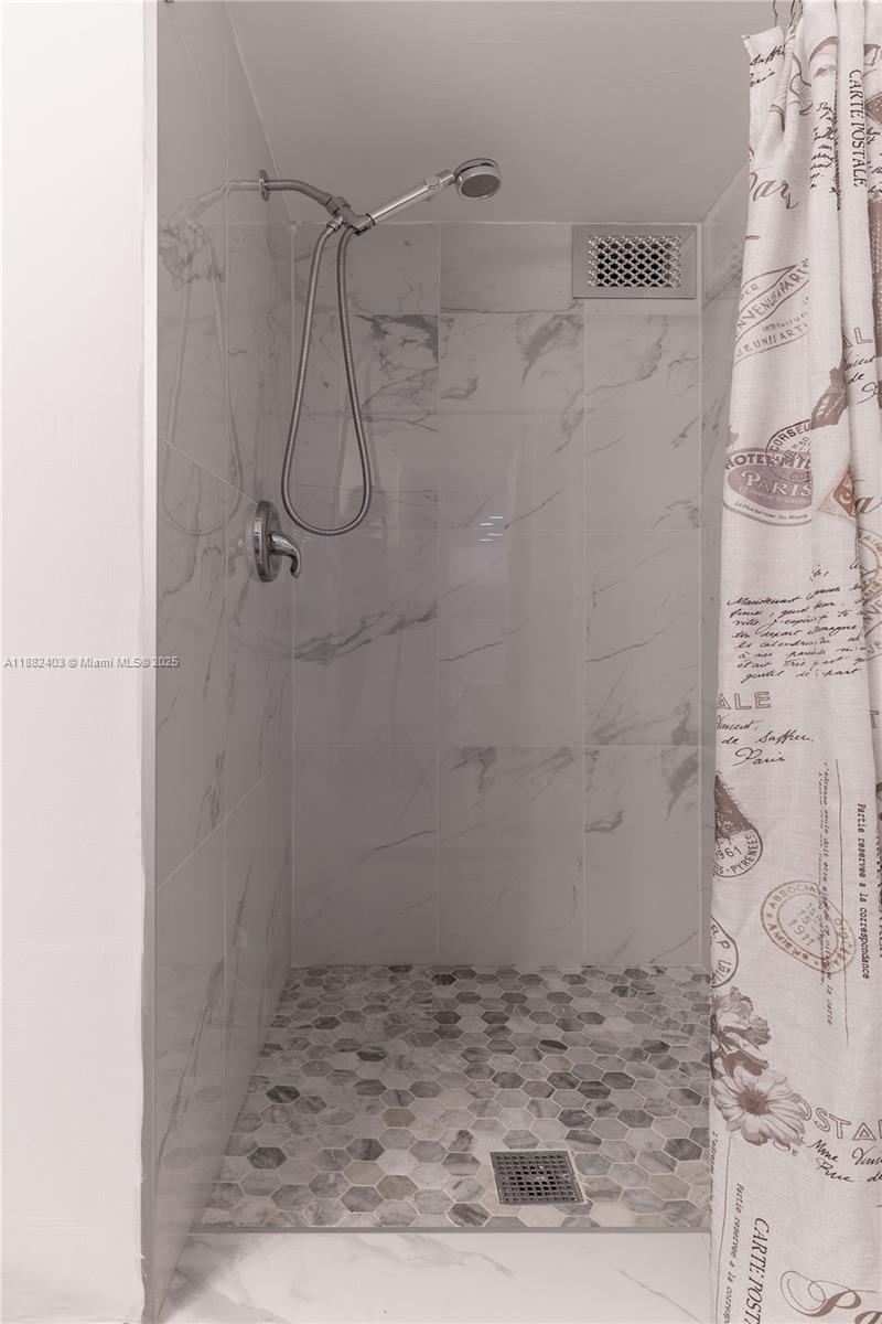 Photo of 427 Golden Isles Dr  #16F, Hallandale Beach, Florida, 33009 - Guest Bathroom