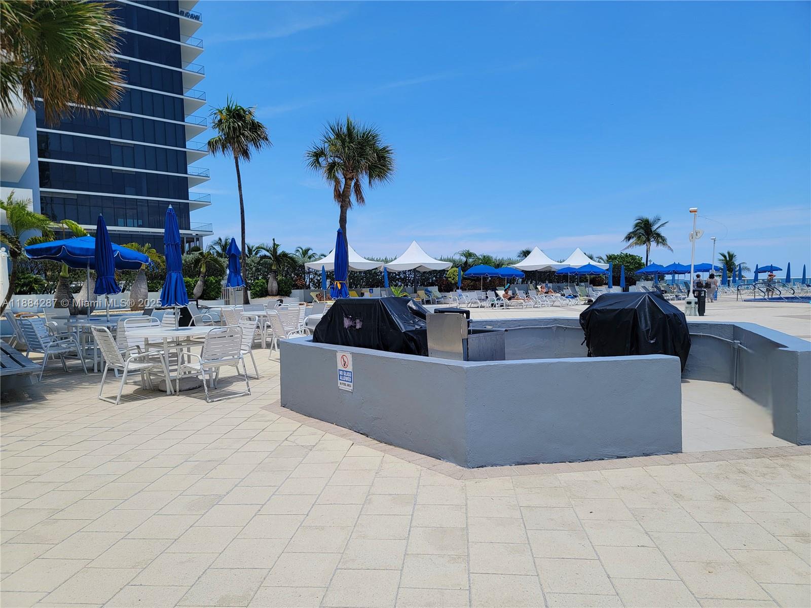Photo of 2030 Ocean Dr  #920, Hallandale Beach, Florida, 33009 - Pool Deck BBQ Picnic Area