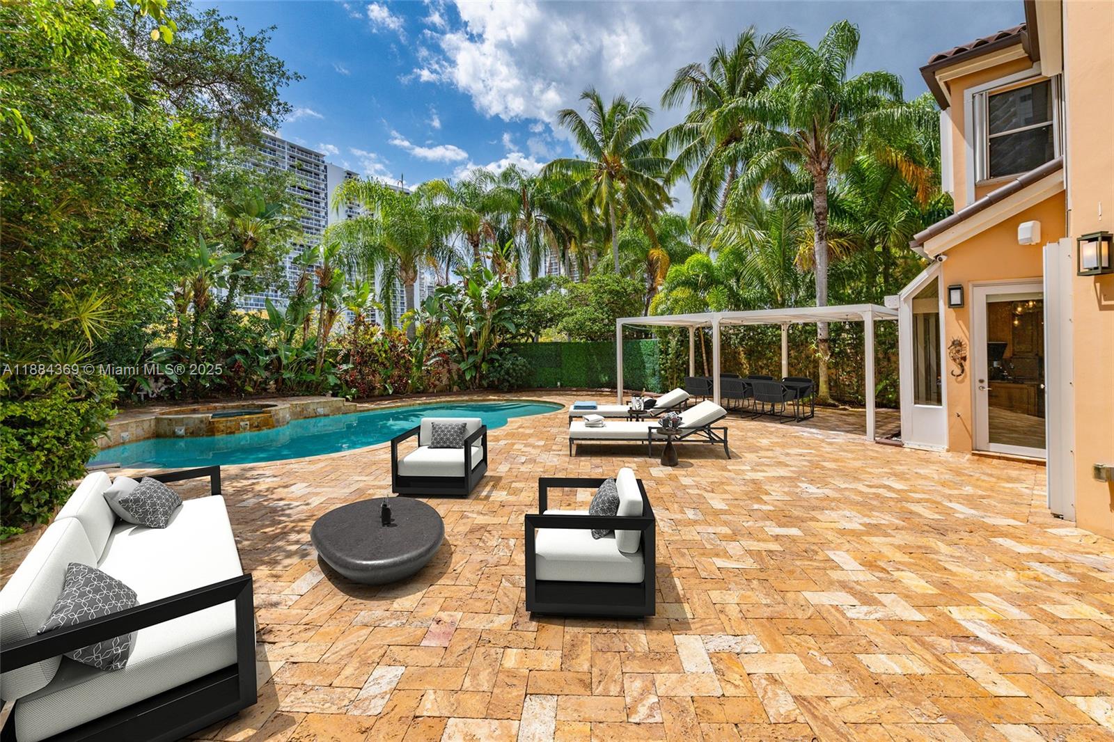 Photo of 3780 207th Ter (3780), Aventura, Florida, 33180 - Virtually Staged Backyard/Patio with pool