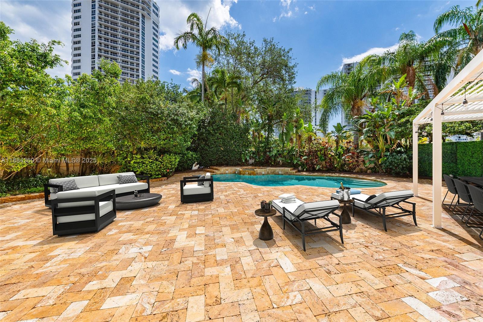 Photo of 3780 207th Ter  (3780), Aventura, Florida, 33180 - Virtually Staged Backyard/Patio with pool
