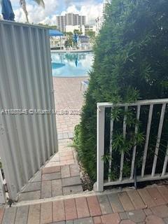 Photo of 3530 Mystic Pointe Dr  #101, Aventura, Florida, 33180 - private entrance to pool