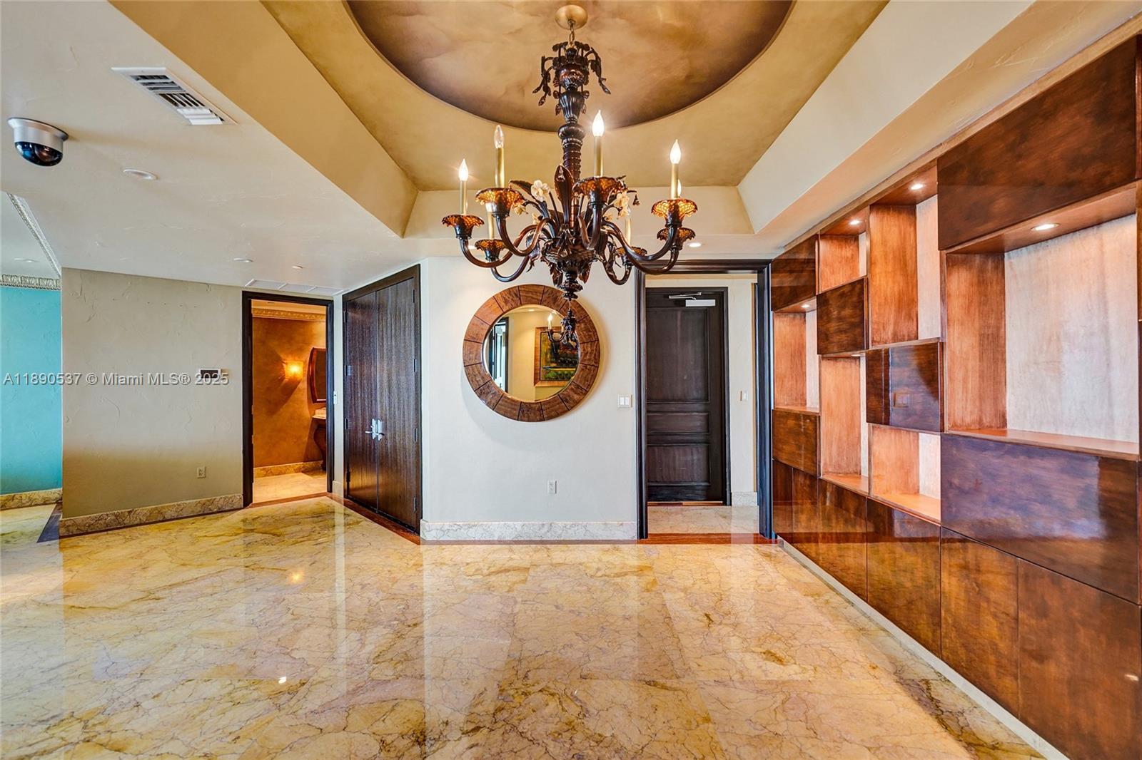 Photo of 16047 Collins Ave  #2101, Sunny Isles Beach, Florida, 33160 - Beautiful built-in wall to wall shelving to display your sculptures and/or accessories.