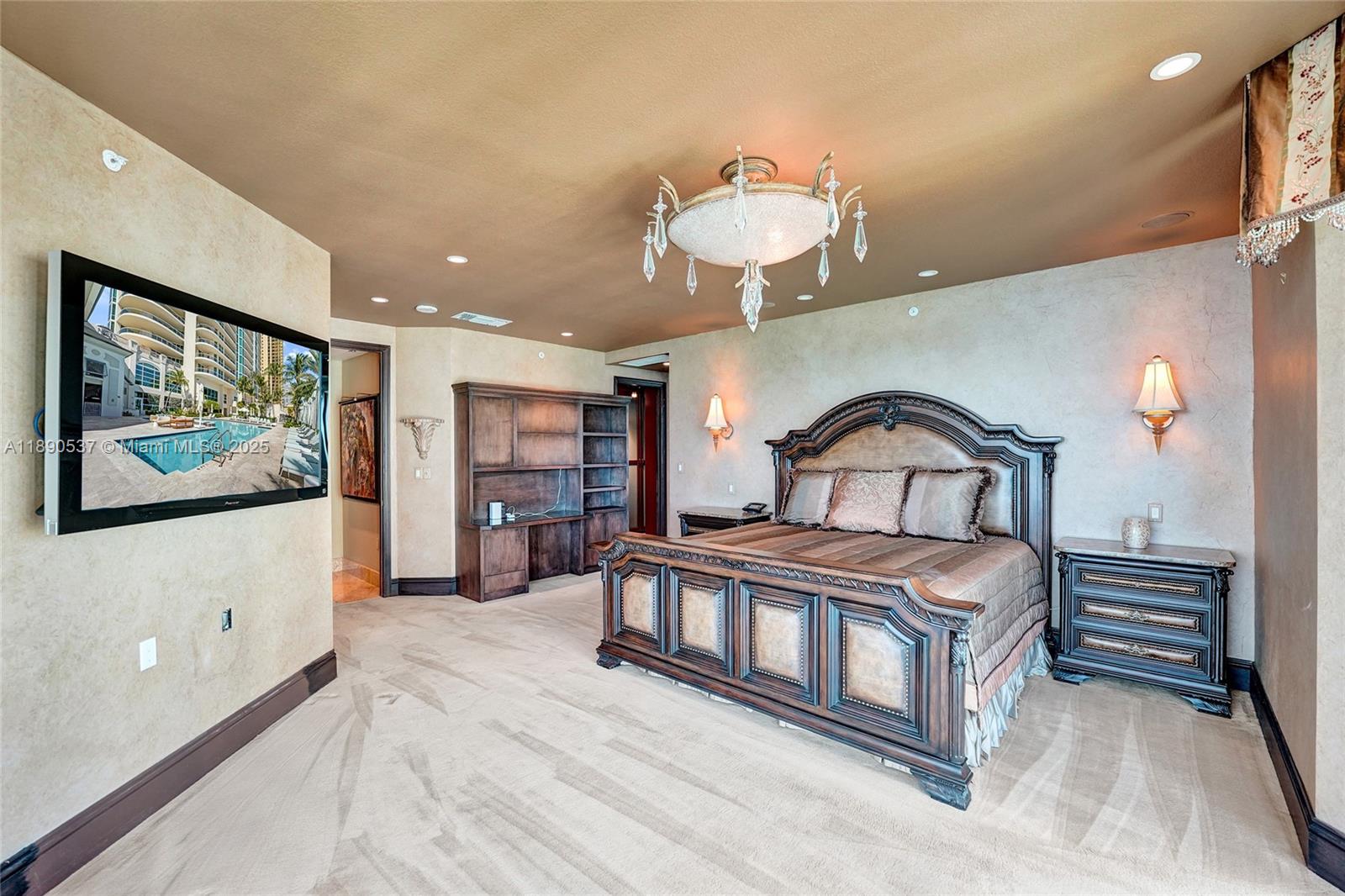 Photo of 16047 Collins Ave  #2101, Sunny Isles Beach, Florida, 33160 - Huge primary bedroom with views of the blue ocean from the bed!