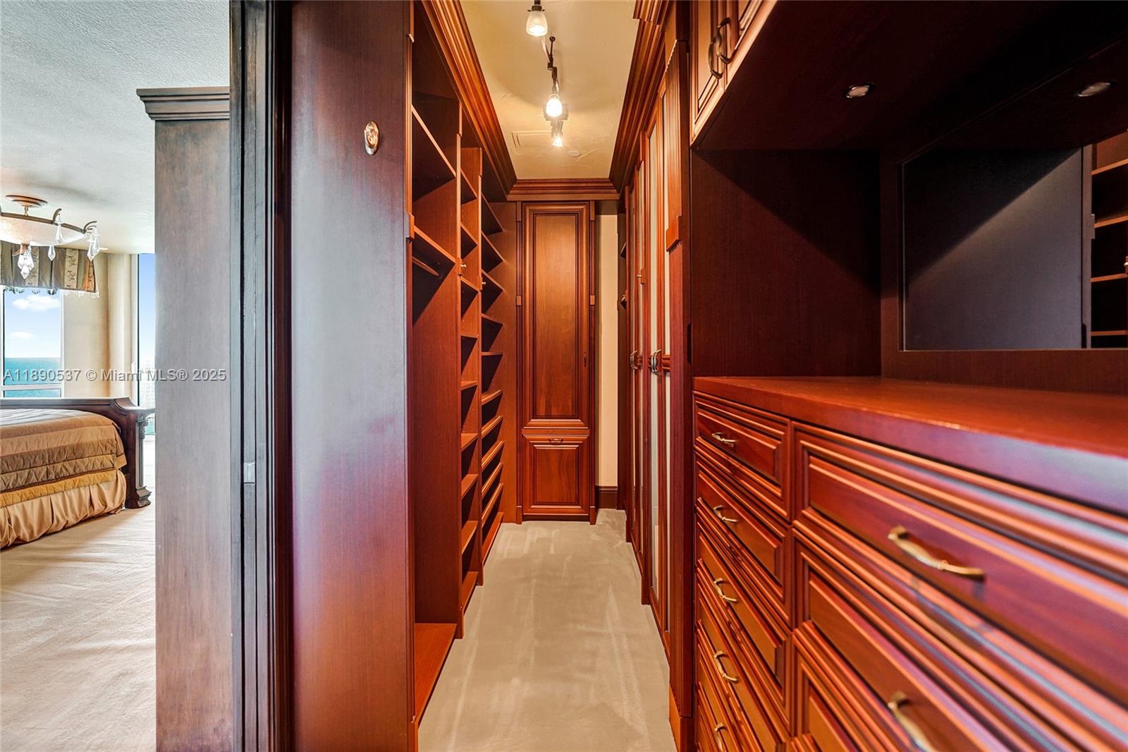 Photo of 16047 Collins Ave  #2101, Sunny Isles Beach, Florida, 33160 - Beautiful primary bedroom with built-in huge closet