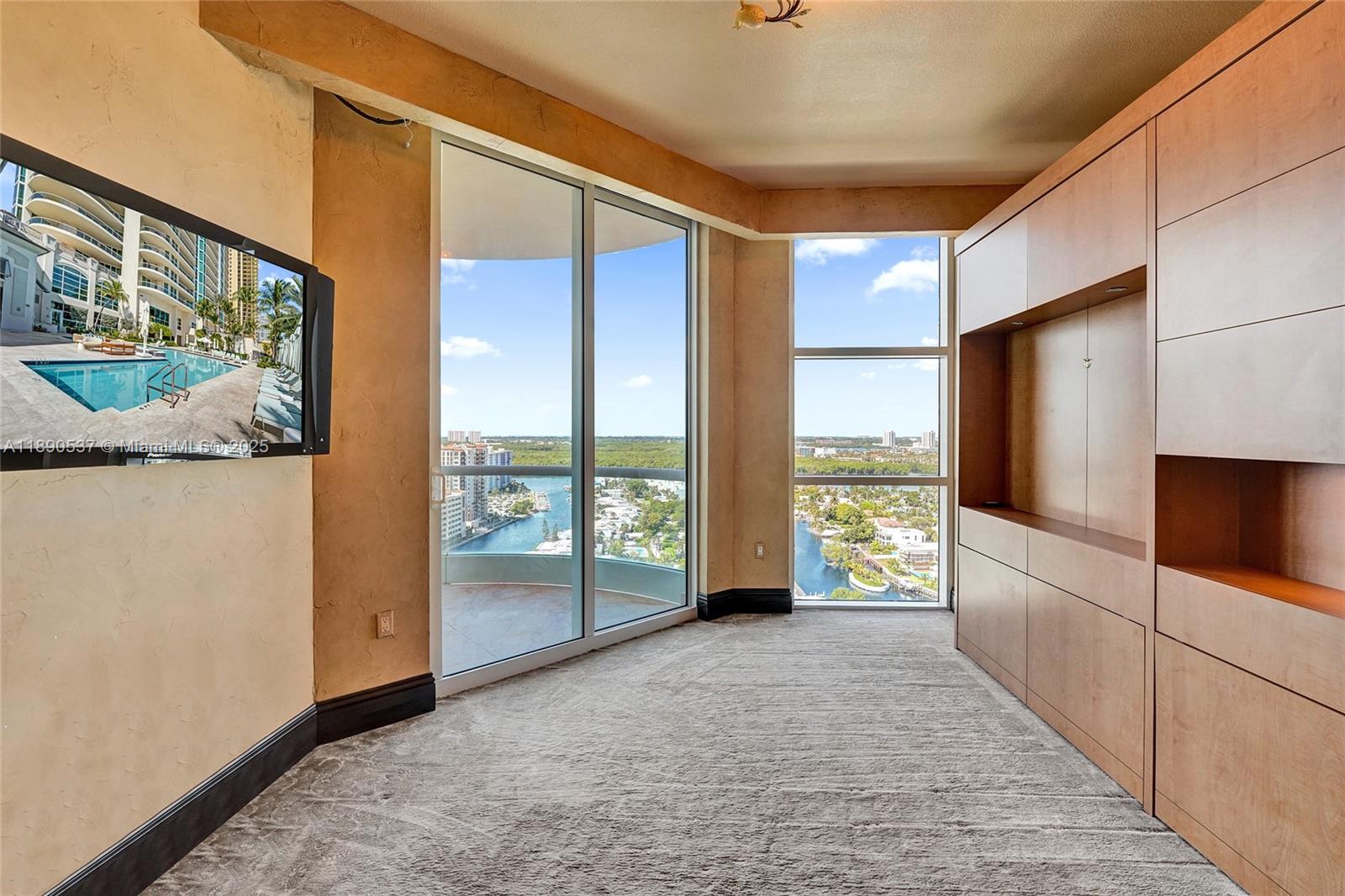 Photo of 16047 Collins Ave  #2101, Sunny Isles Beach, Florida, 33160 - Another bedroom with balcony and the most gorgeous water and city views!