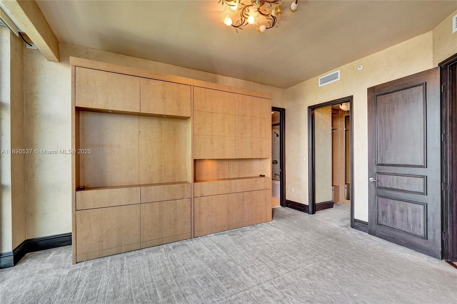 Photo of 16047 Collins Ave  #2101, Sunny Isles Beach, Florida, 33160 - Another bedroom with built -ins and Murphy bed