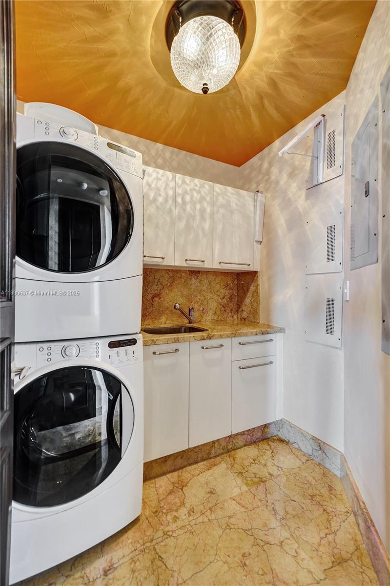 Photo of 16047 Collins Ave  #2101, Sunny Isles Beach, Florida, 33160 - Huge washer/dryer with lots of cabinetry