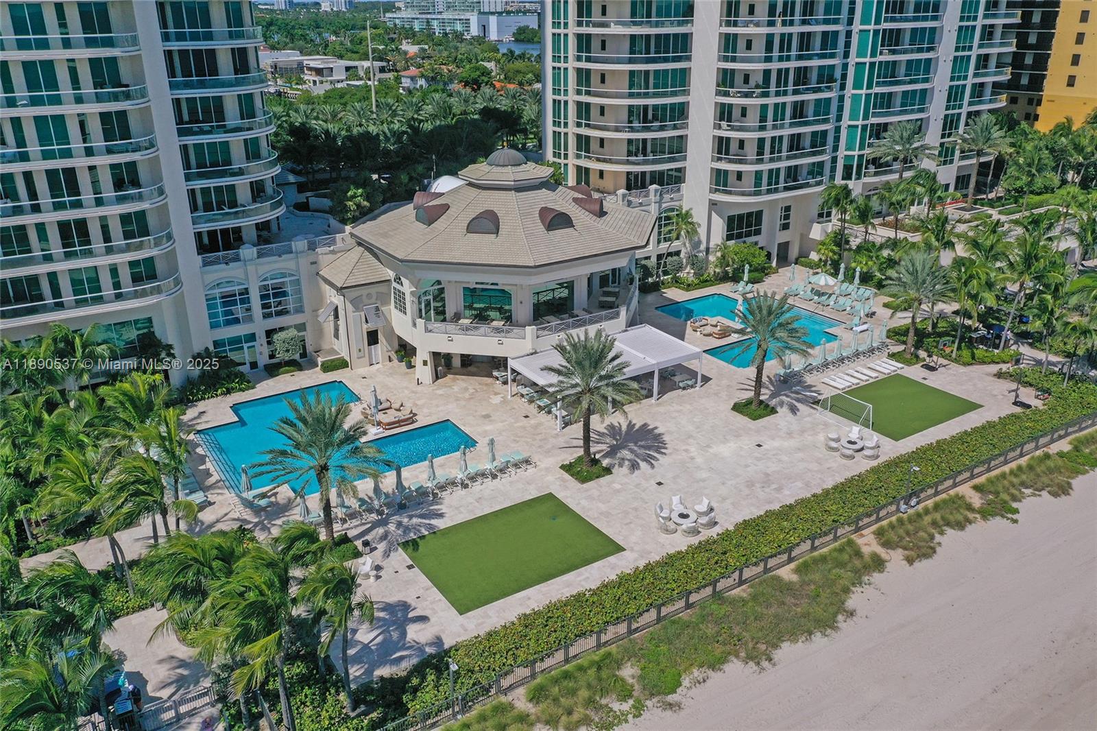 Photo of 16047 Collins Ave  #2101, Sunny Isles Beach, Florida, 33160 - View of the 2  pools and 2 towers
