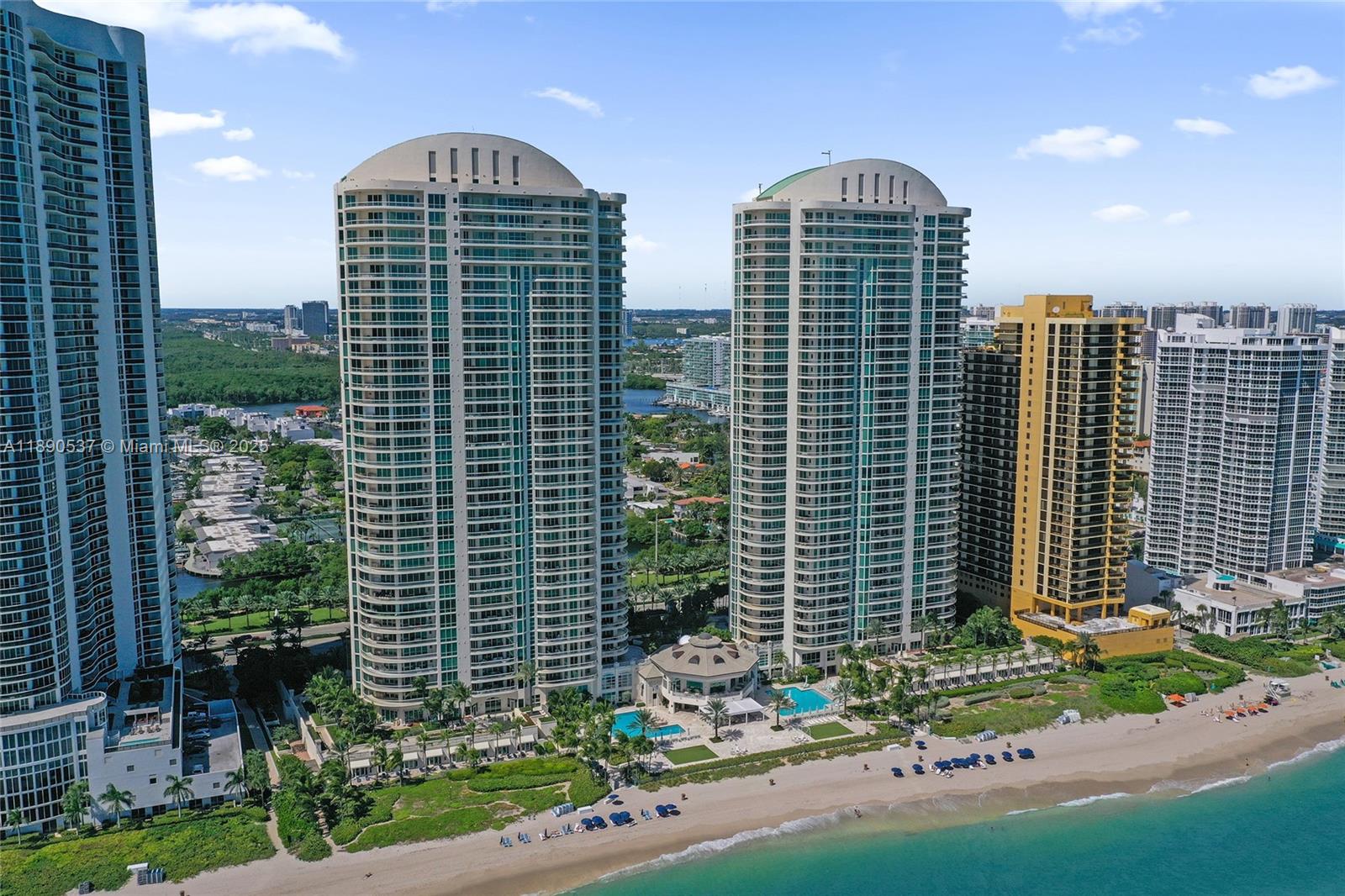 Photo of 16047 Collins Ave  #2101, Sunny Isles Beach, Florida, 33160 - The 2 buildings of Turnberry Ocean Colony overlooking the beach/ocean.