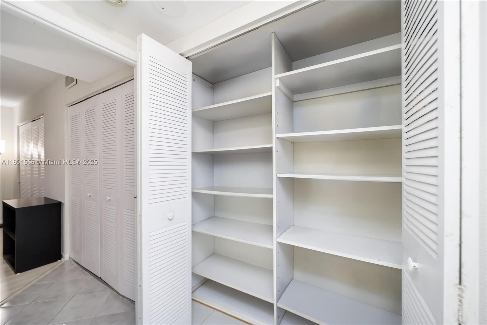 Photo of 600 Three Islands Blvd  #1021, Hallandale Beach, Florida, 33009 - Hallway built-in closet