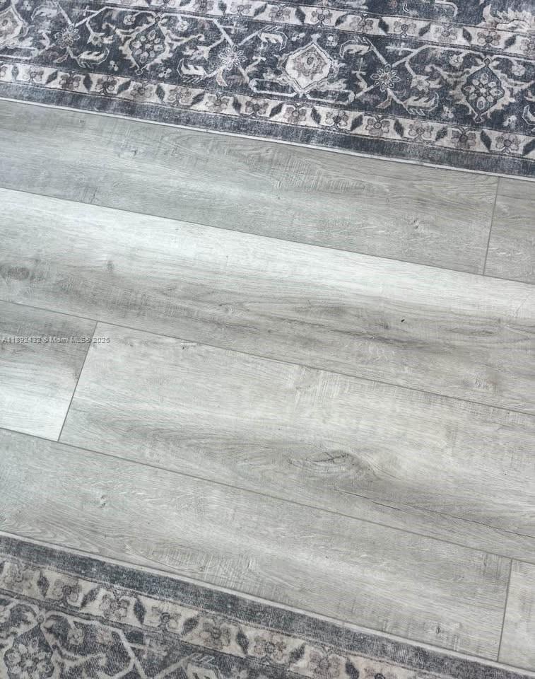 Photo of 17100 Bay Rd  #1110, Sunny Isles Beach, Florida, 33160 - Brand new tiles throught in the entire unit.