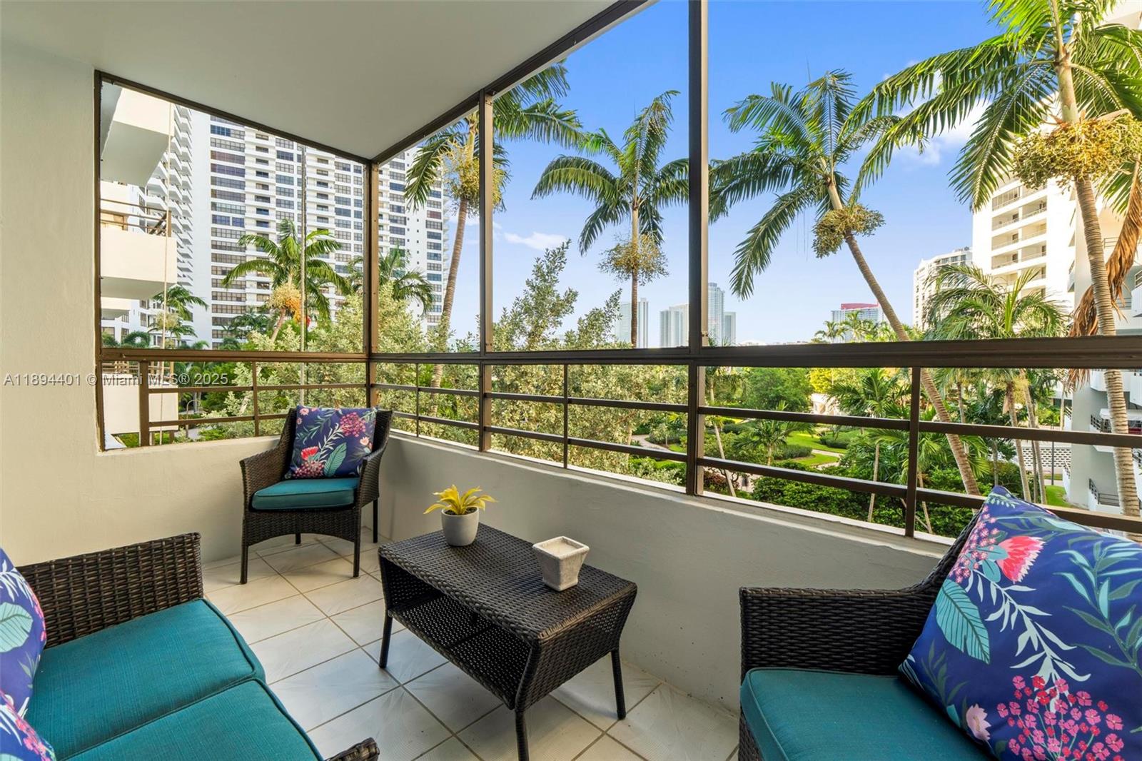 Photo of 600 Three Islands Blvd  #317, Hallandale Beach, Florida, 33009 - Private balcony overlooking lush grounds